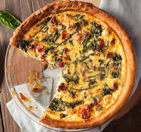stock-photo-homemade-cheesy-egg-quiche-for-brunch-with-spinach-and-tomato-455548966